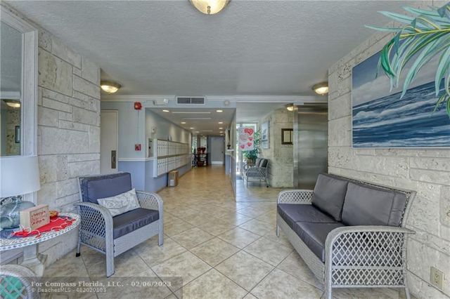 a view of swimming pool with chairs