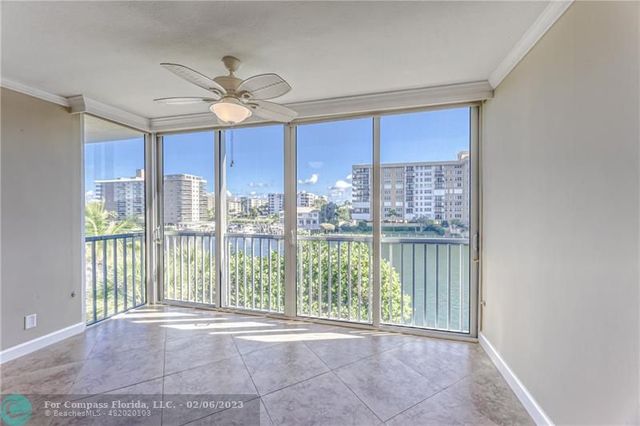 a view of an entryway with a floor to ceiling window