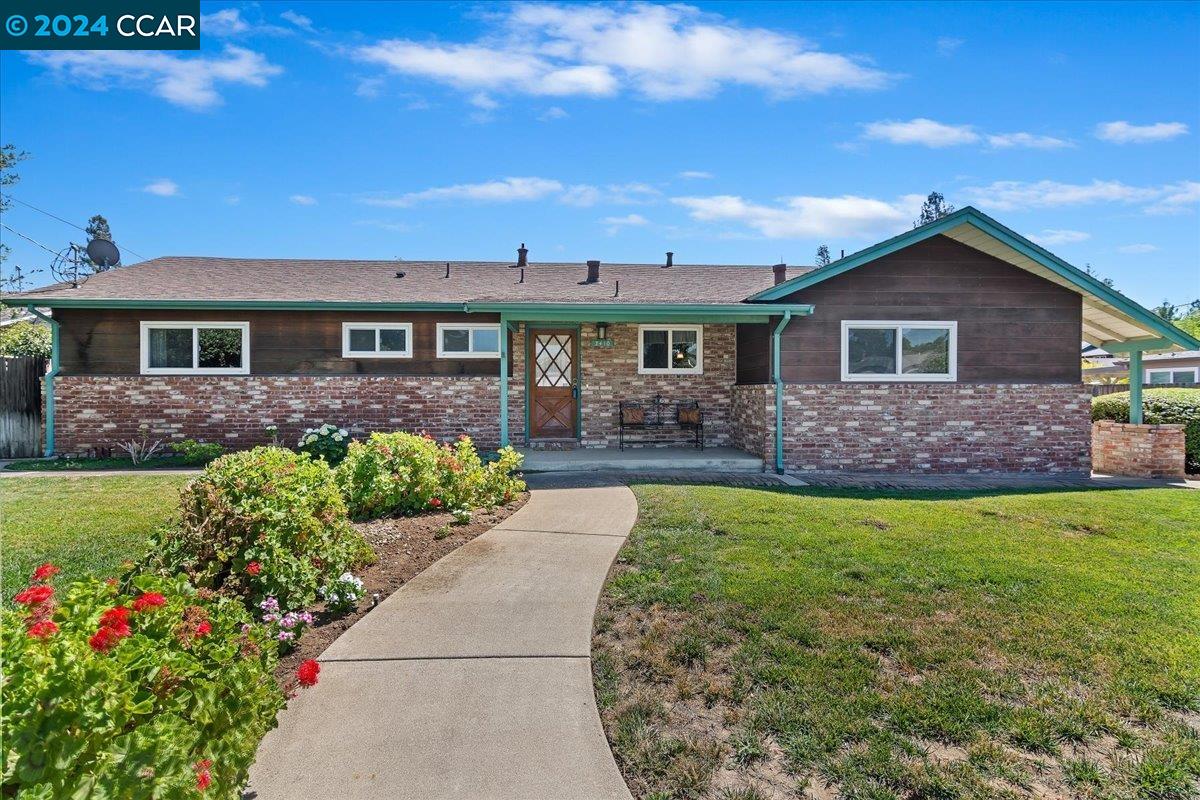 3410 Cowell Road Concord, CA 94518 - Photo 1 of 1 a front view of a house with a garden