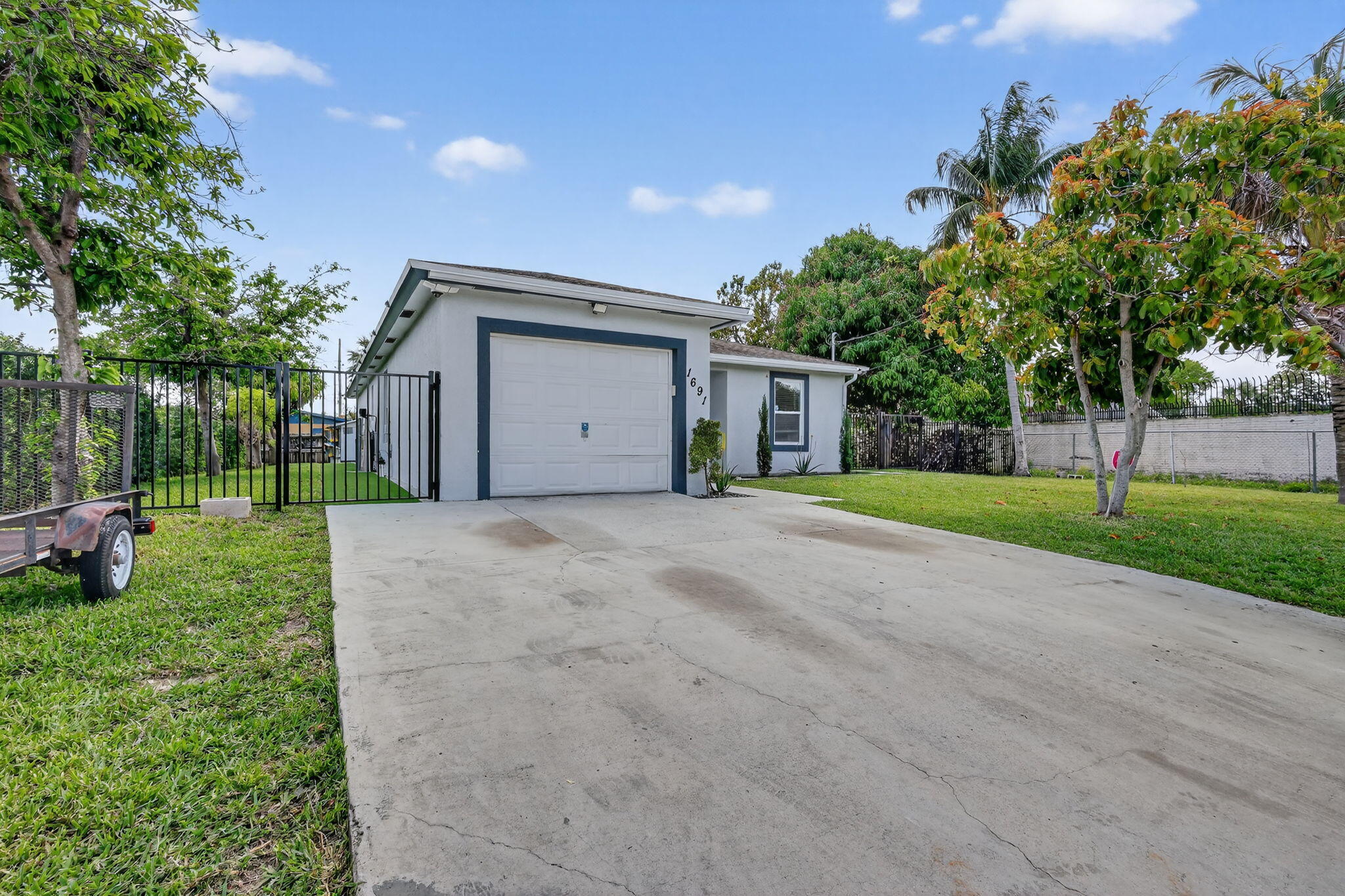 1691 West 26th Court Riviera Beach, FL 33404 - Photo 2 of 48 1-web-or-mls-F14A8769