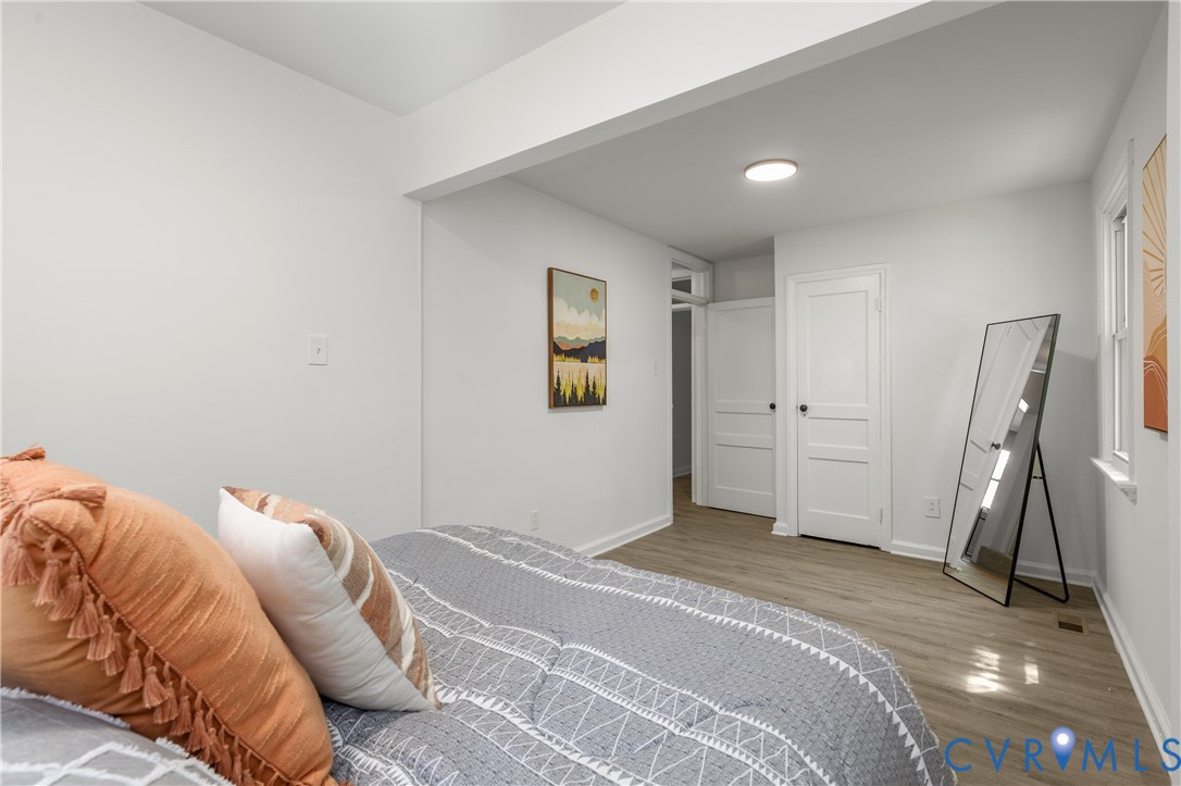 3406 Meadowbridge Road Richmond, VA 23222 - Photo 26 of 41 a bedroom with a bed and a window