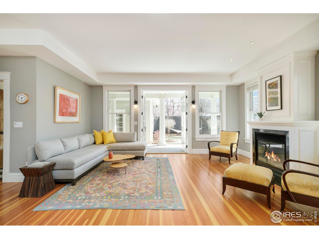 720 Mapleton Avenue Boulder, CO 80302 - Photo 16 of 40 The dining and living room open onto the wrap around covered porches...