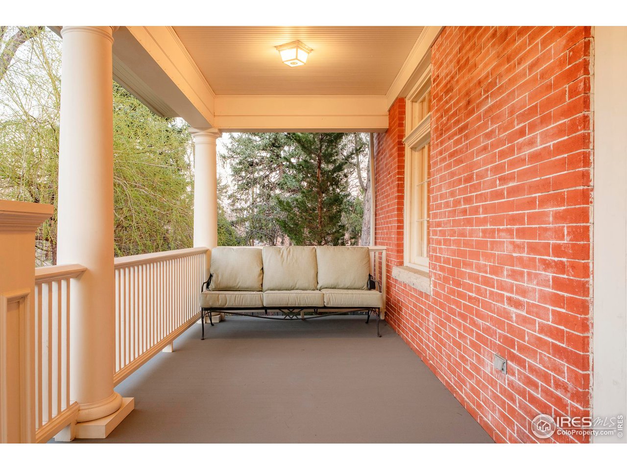 720 Mapleton Avenue Boulder, CO 80302 - Photo 2 of 40 The inviting front porch is a lovely spot for visiting with family, friends & neighbors.