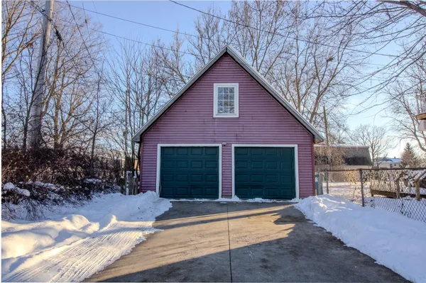 a front view of a house with yard