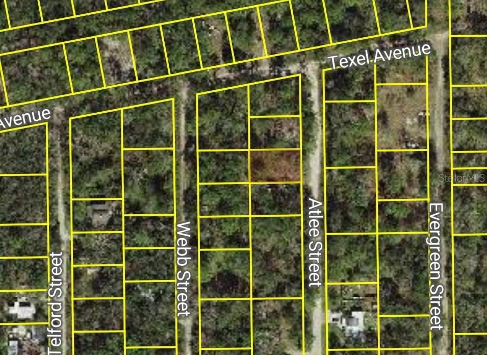 Atlee Street New Port Richey, FL 34654 - Photo 2 of 2 a view of a door with a window