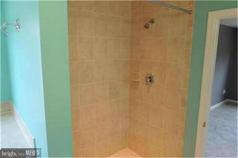 5952 Tyler Road Deale, MD 20751 - Photo 13 of 21 a bathroom with a shower