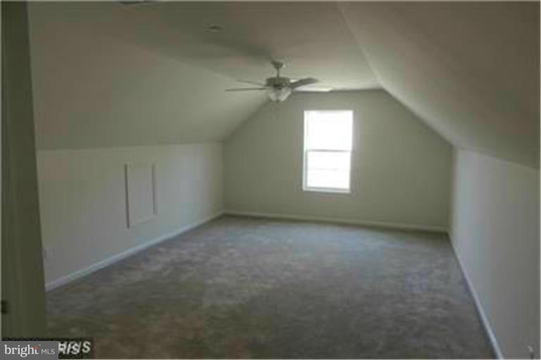 5952 Tyler Road Deale, MD 20751 - Photo 16 of 21 an empty room with a window and a fan