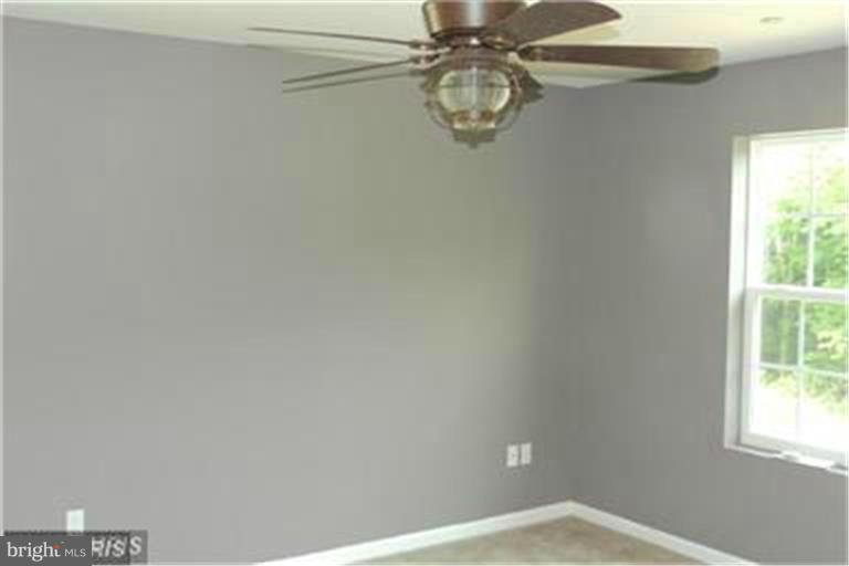 5952 Tyler Road Deale, MD 20751 - Photo 8 of 21 a view of a small space with a window