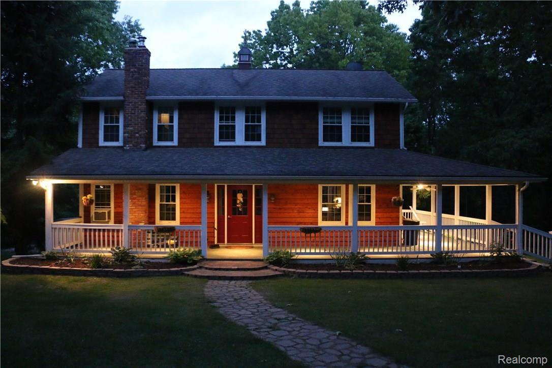 9404 Mabley Hill Road Fenton, MI 48430 - Photo 45 of 46 You'll love driving home to this view at night.