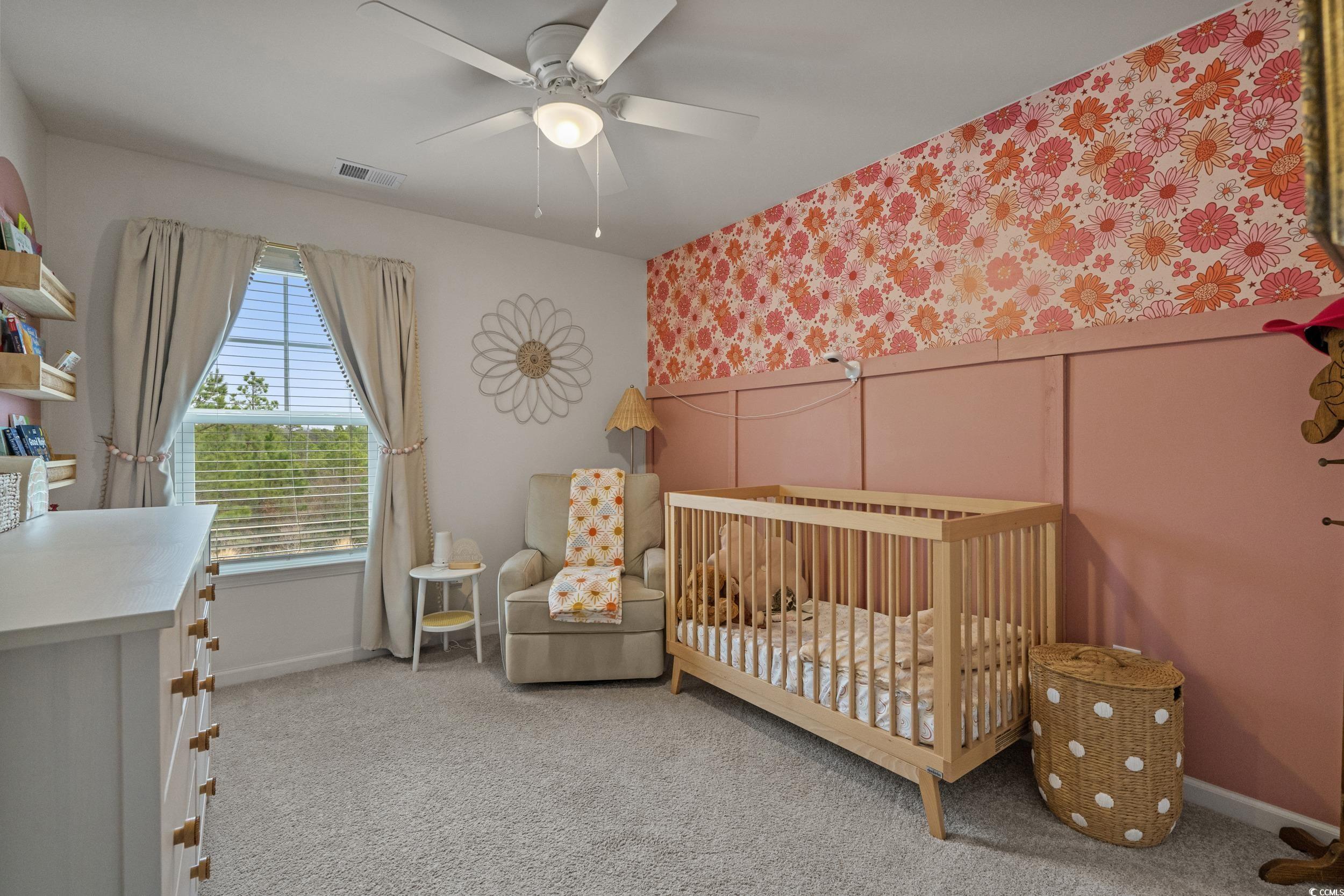 3343 Bells Lake Circle Longs, SC 29568 - Photo 20 of 40 Bedroom with a nursery area, light colored carpet, ceiling fan, and wallpapered walls