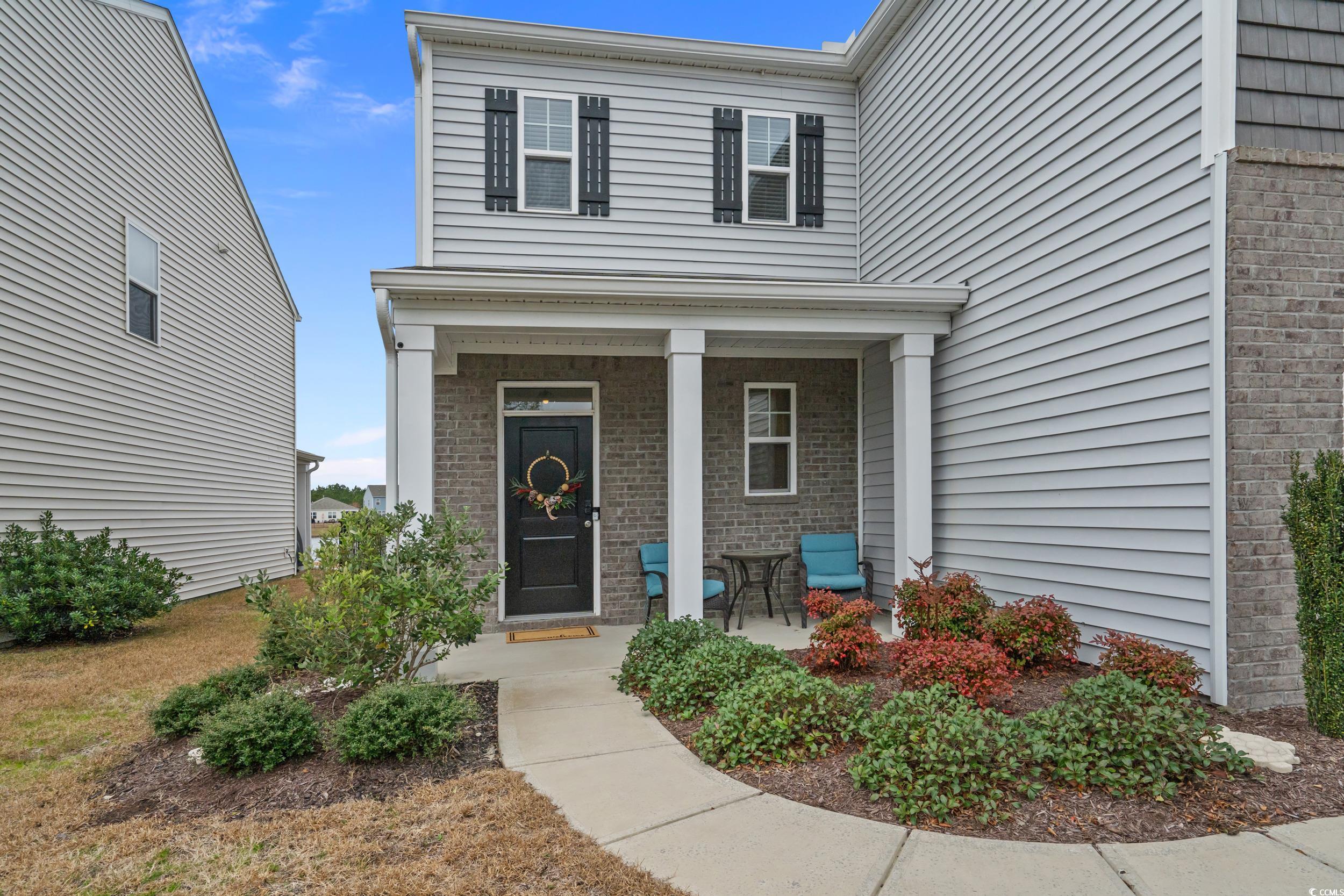 3343 Bells Lake Circle Longs, SC 29568 - Photo 4 of 40 Entrance to property with brick siding and covered porch