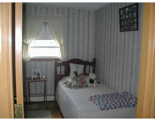 55 Summit Street Salem, MA 01970 - Photo 6 of 8 a bed room with a bed and a window