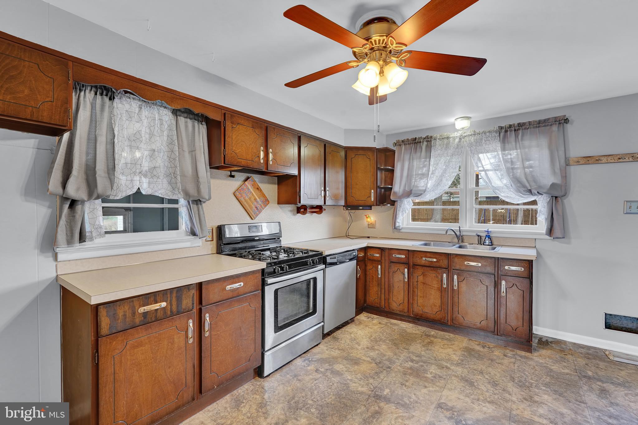 2370 Sycamore Road York, PA 17408 - Photo 9 of 24 a kitchen with stainless steel appliances granite countertop a stove and a sink