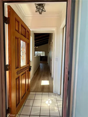 a kitchen with stainless steel appliances a stove refrigerator and a sink