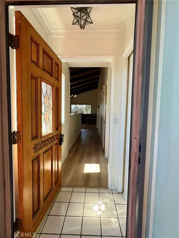 a kitchen with stainless steel appliances a stove refrigerator and a sink