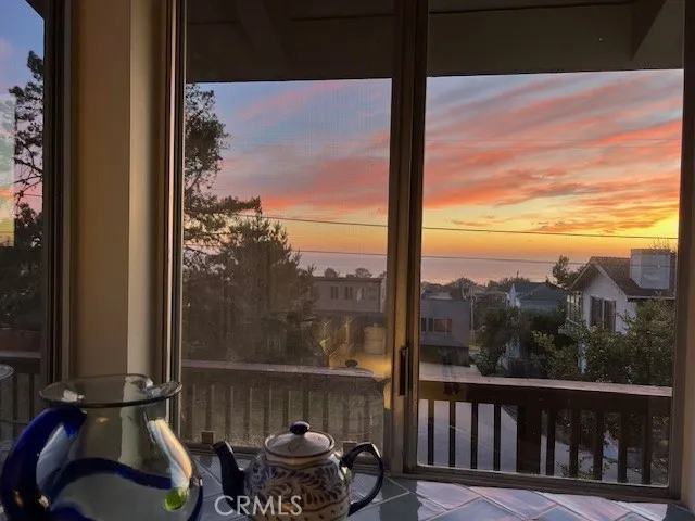 a dining room with furniture window wooden floor