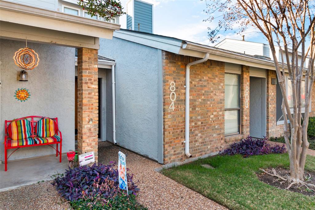 17490 Meandering Way, Unit 804 Dallas, TX 75252 - Photo 2 of 33 a front view of a house with garden