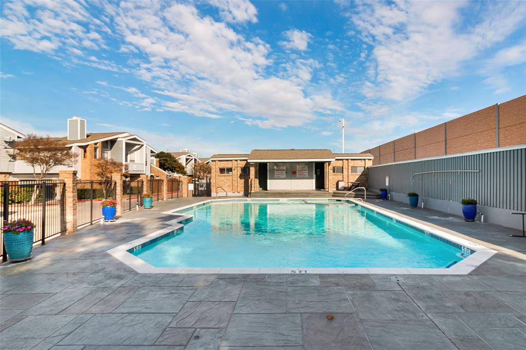 17490 Meandering Way, Unit 804 Dallas, TX 75252 - Photo 29 of 33 a view of a house with a backyard