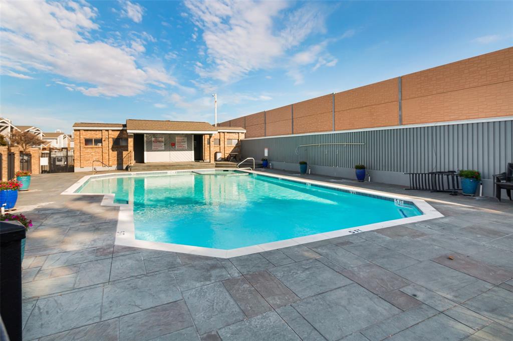 17490 Meandering Way, Unit 804 Dallas, TX 75252 - Photo 30 of 33 a view of a swimming pool with a yard