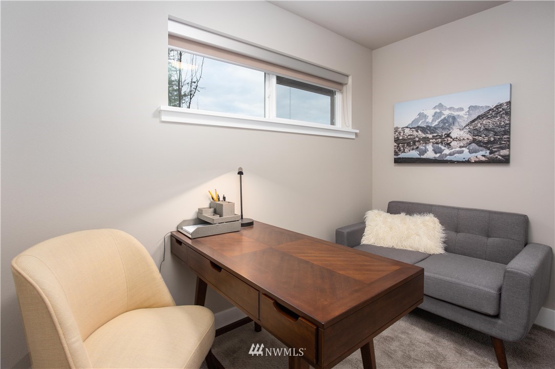 1880 Front Street, Unit 206 Lynden, WA 98264 - Photo 16 of 30 a living room with furniture and a window