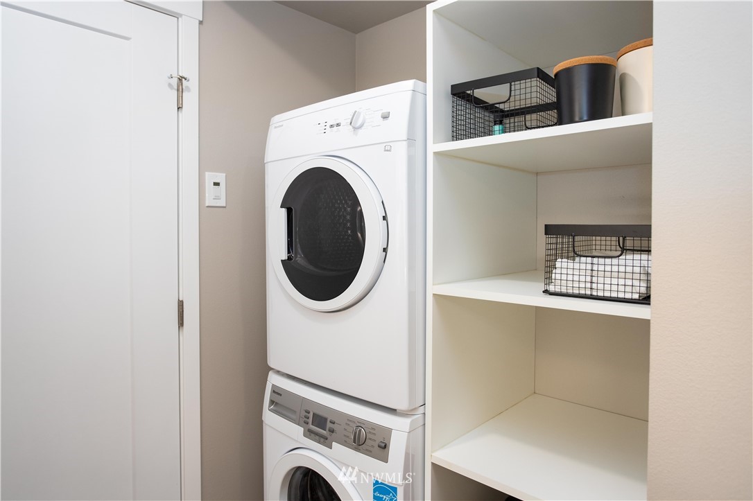 1880 Front Street, Unit 206 Lynden, WA 98264 - Photo 21 of 30 a utility room with dryer and washer
