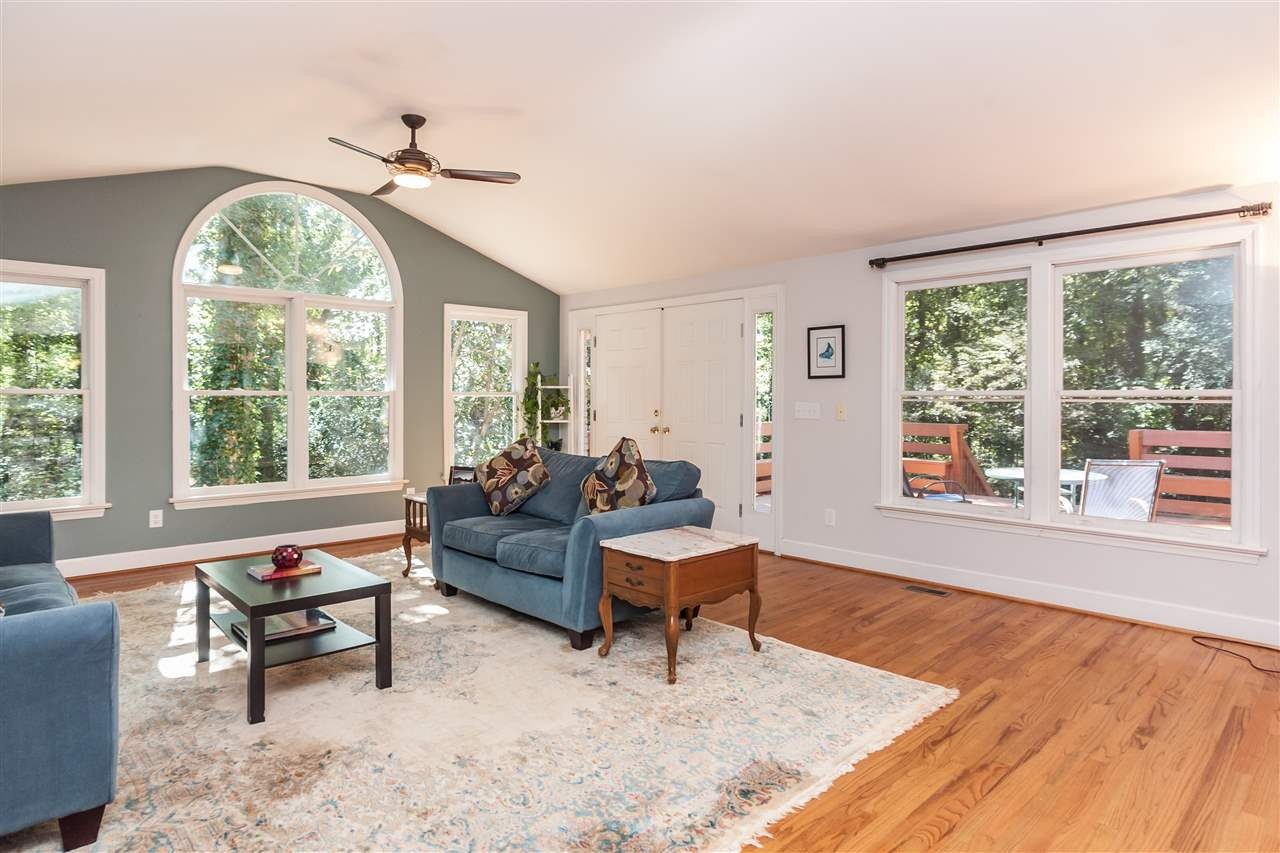 2845 Oberry Street Raleigh, NC 27607 - Photo 12 of 25 French doors lead to a large private deck perfect for entertaining. Great Room