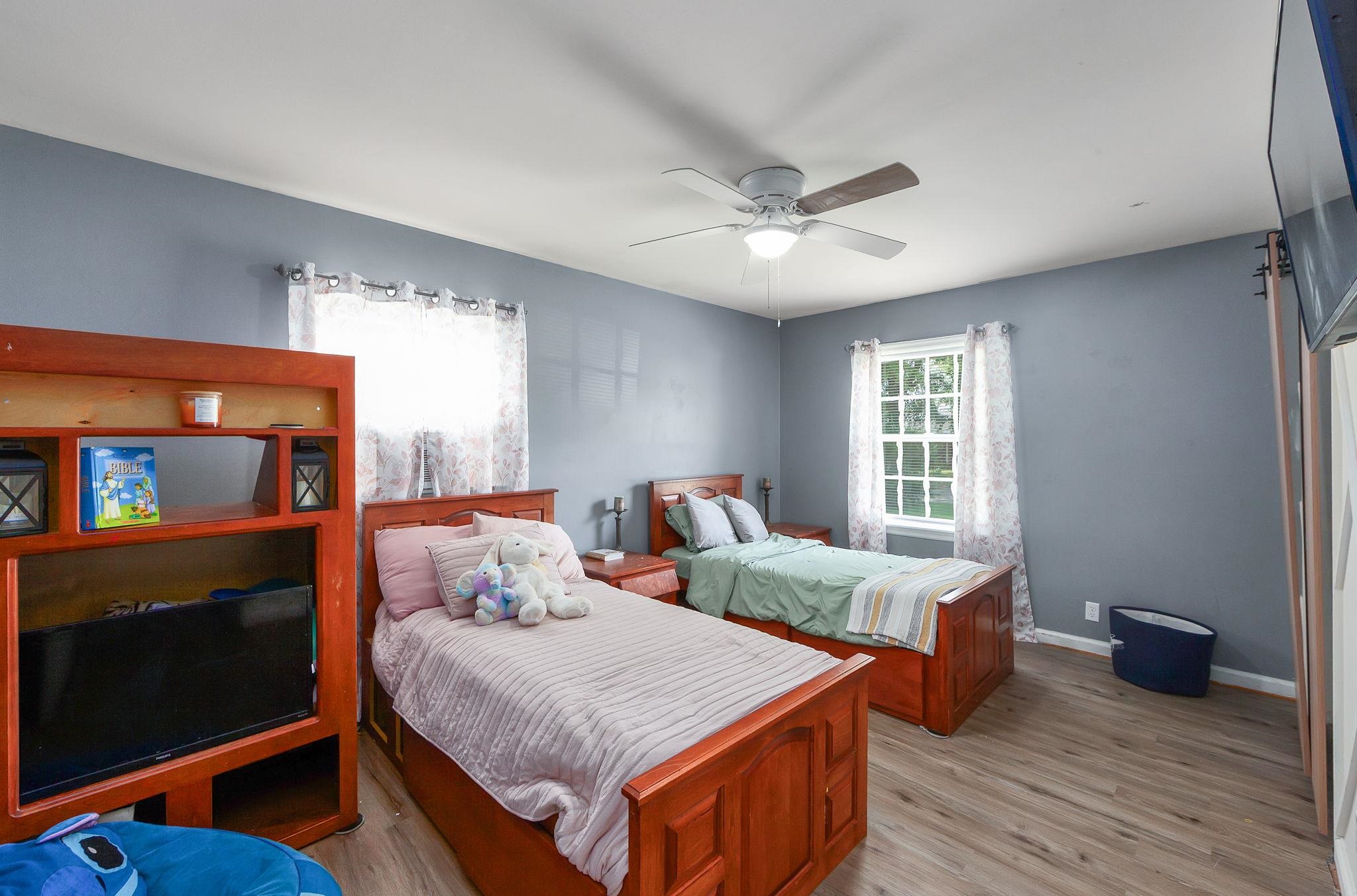 624 Ridgeway Drive Bolivar, TN 38008 - Photo 13 of 19 a bedroom with two beds and a window
