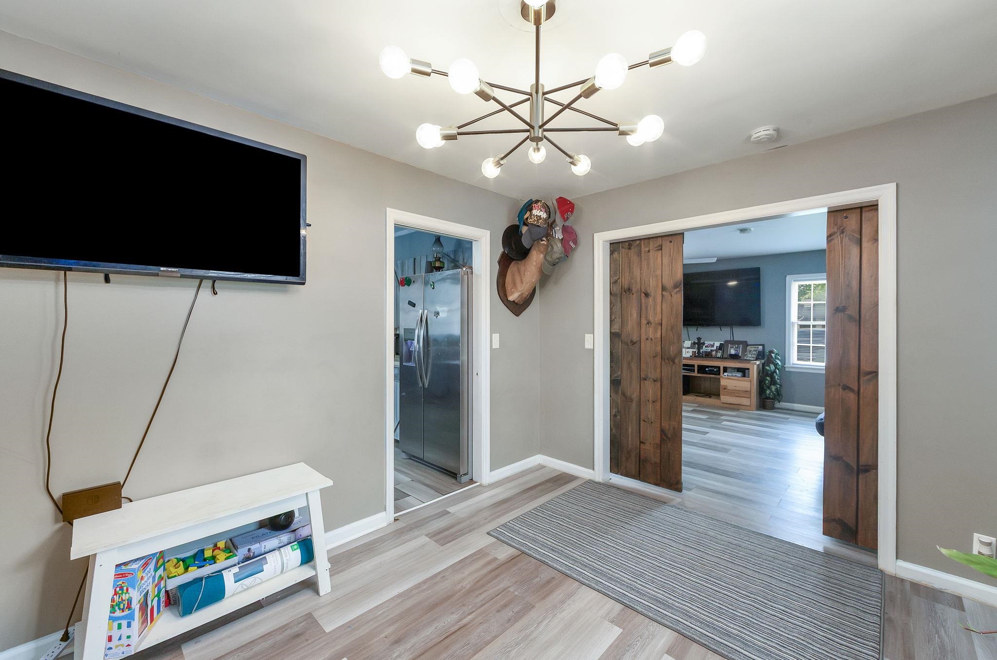 624 Ridgeway Drive Bolivar, TN 38008 - Photo 6 of 19 a view of a livingroom with kitchen and furniture