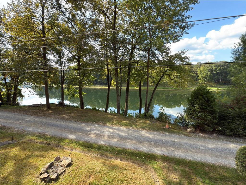 876 North Tunnel Road Kennerdell, PA 16374 - Photo 14 of 42 a view of a yard with a tree