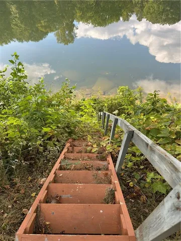 a view of roof with wooden floor