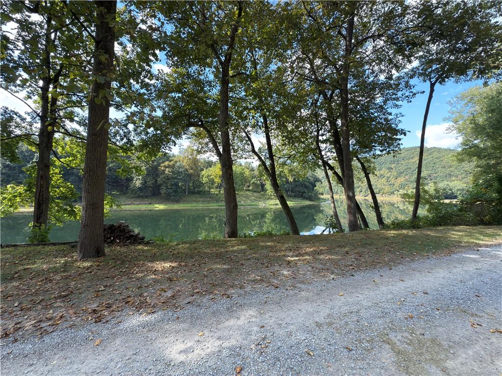876 North Tunnel Road Kennerdell, PA 16374 - Photo 2 of 42 a backyard of a house with lots of green space