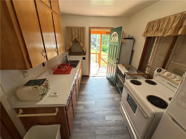 a room with furniture and a flat screen tv