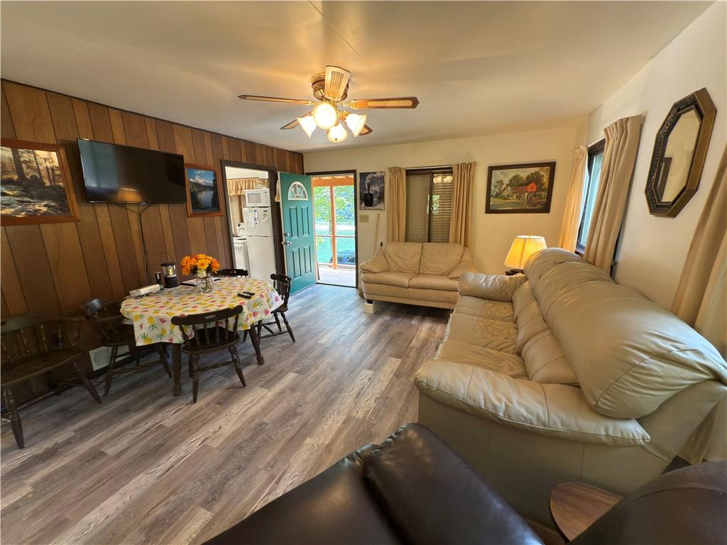 876 North Tunnel Road Kennerdell, PA 16374 - Photo 27 of 42 a living room with furniture and a chandelier