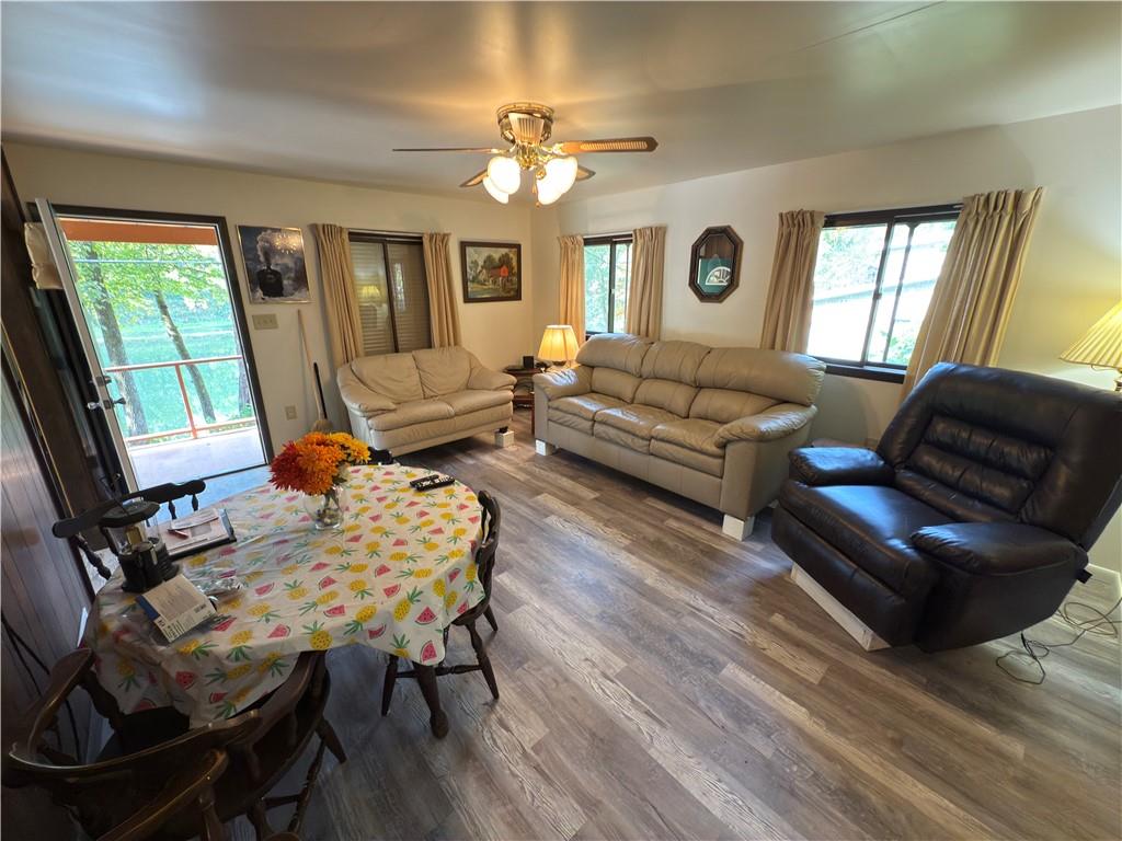 876 North Tunnel Road Kennerdell, PA 16374 - Photo 28 of 42 a living room with furniture and a chandelier