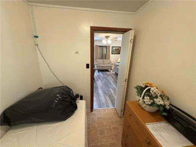 a bedroom with a bed and a cabinets