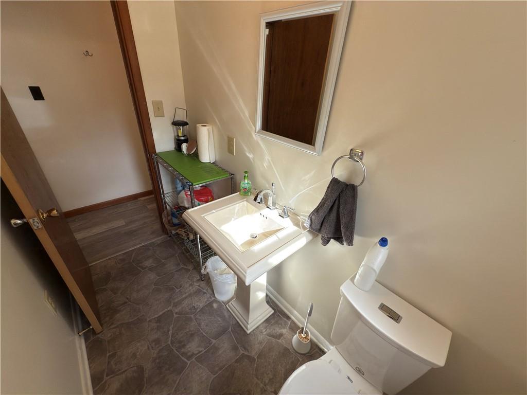 876 North Tunnel Road Kennerdell, PA 16374 - Photo 34 of 42 a living room with furniture and a flat screen tv