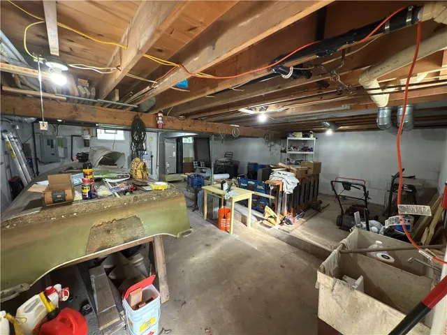 a view of parking garage with cars