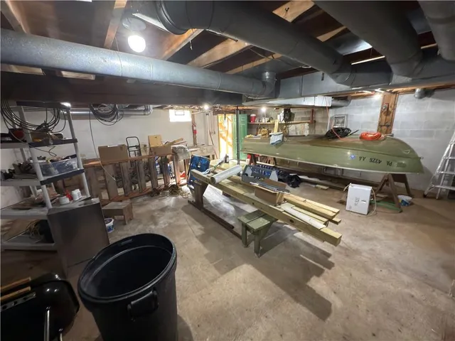 a view of parking garage with cars