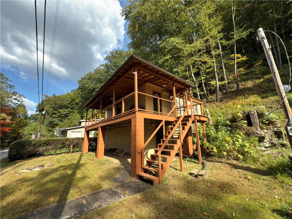 876 North Tunnel Road Kennerdell, PA 16374 - Photo 10 of 42 a view of a house with a yard