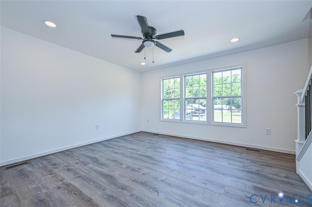 993 Swan Lane Ruther Glen, VA 22546 - Photo 5 of 31 wooden floor in an empty room with a window