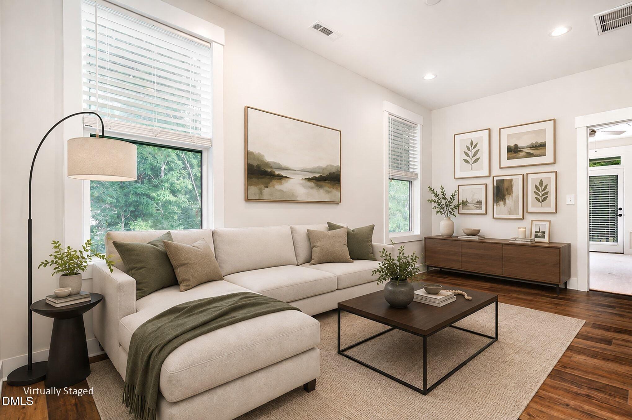 4016 Emerald Green Road Raleigh, NC 27612 - Photo 8 of 22 a living room with furniture and a large window