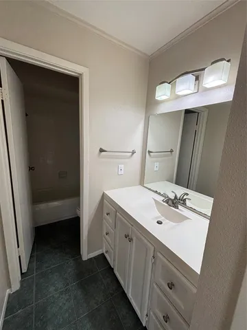 a view of empty room with windows