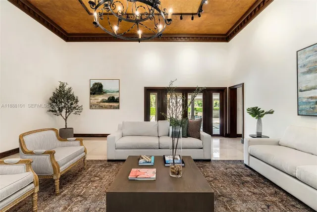 a kitchen with kitchen island granite countertop a stove oven and a sink