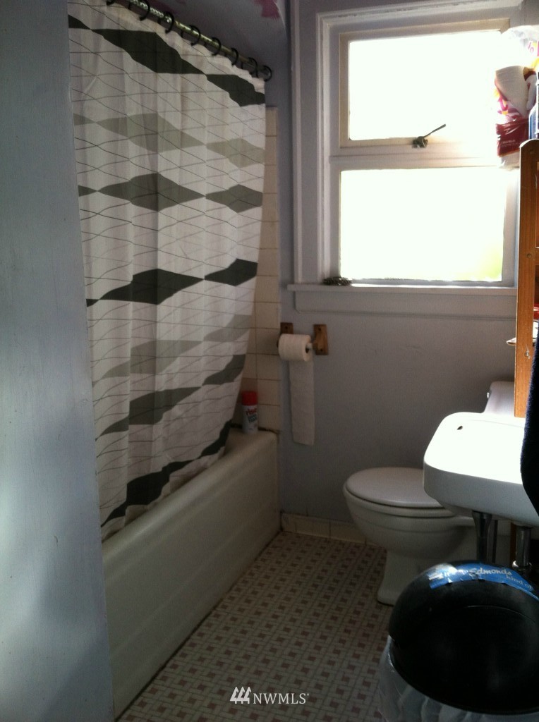 816 North 46th Street Seattle, WA 98103 - Photo 21 of 21 a bathroom with a sink toilet and shower