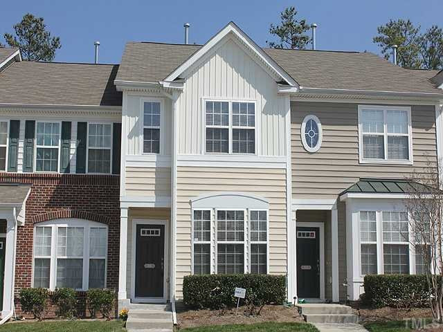 106 Cedar Elm Road Durham, NC 27713 - Photo 1 of 23 a front view of a house with a yard
