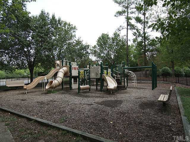 106 Cedar Elm Road Durham, NC 27713 - Photo 23 of 23 a view of a park with swings