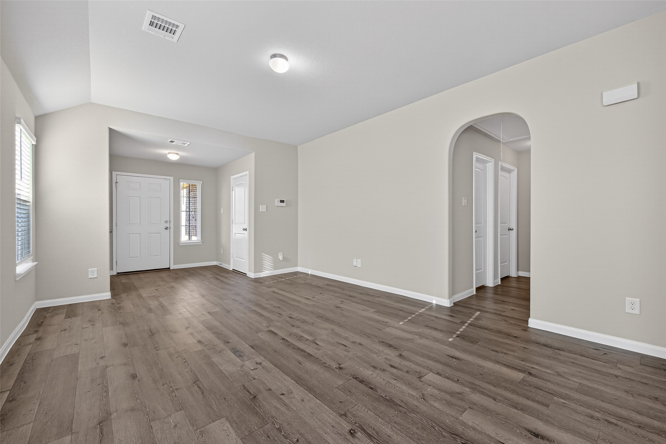23646 Buttress Root Drive Spring, TX 77373 - Photo 2 of 9 a view of a room with wooden floor and window