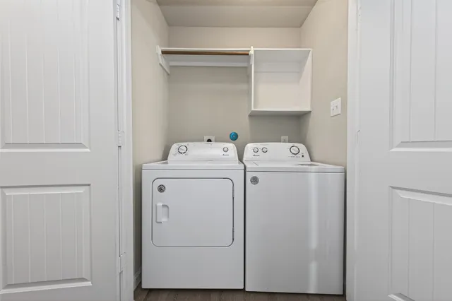 a utility room with dryer and washer