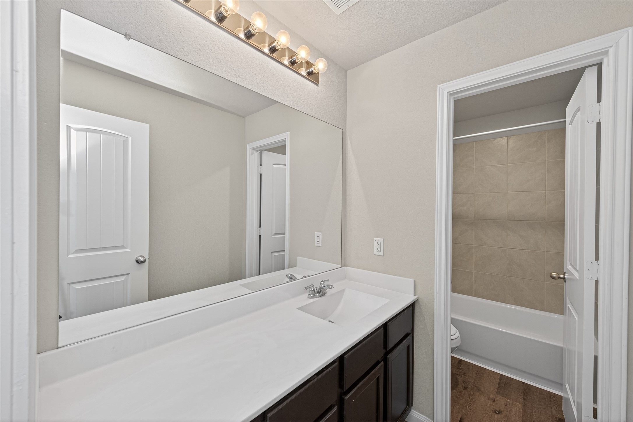 23646 Buttress Root Drive Spring, TX 77373 - Photo 8 of 9 a bathroom with a sink and a mirror