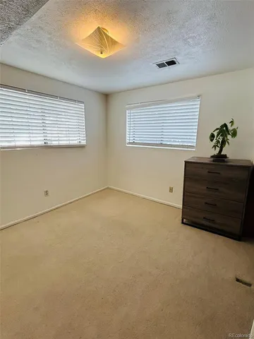 a kitchen with a stove and a sink
